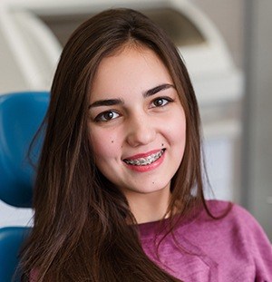 girl in exam chair with braces