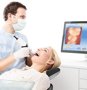 woman getting cerec impression